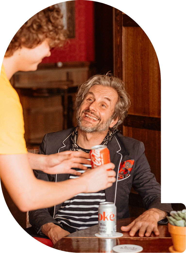 Quirky Quarter Q graphic with a man being served a coke inside